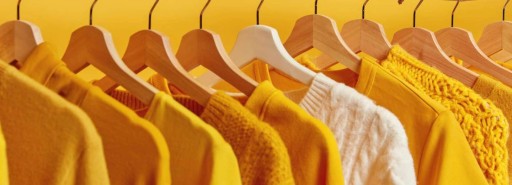 Yellow clothing on hangers