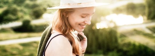 Girl wearing a hat and smiling