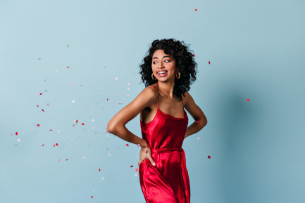 Woman wearing red silk dress