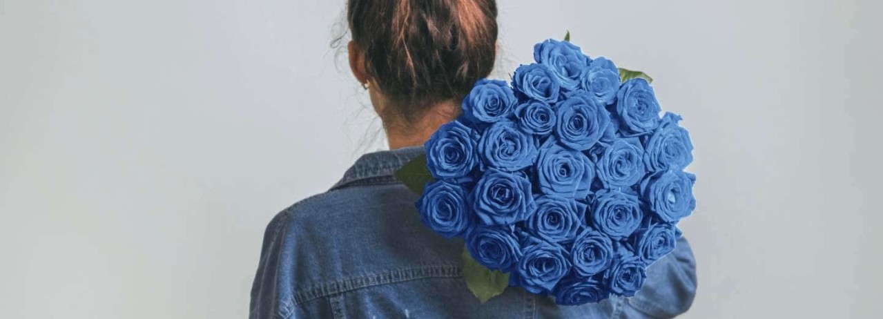 Woman wearing denim with blue roses